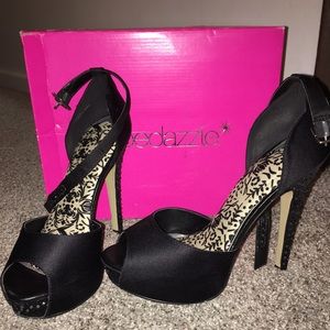 Black and sparkly high heeled shoes